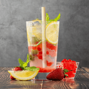 Mini boba fruit tea with a HAY! straw jumbo XL straw, made from reed stems and 100% compostable.