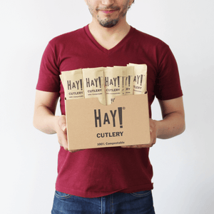 HAY Bamboo Cutlery About Page, Picture shows man holding a case of HAY Cutlery