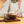 Woman holding a coffee cup with a jumbo slim 6